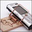 Photo illustration of a phone in a mousetrap