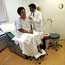 A doctor examines a patient