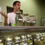 A bud tender at a marijuana dispensary