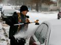 Getting out the snow brush