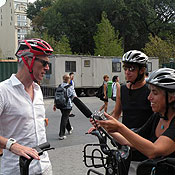 Reporter Andrea Bernstein interviews musician David Byrne in New York as New York City Transportation Commissioner Janette Sadik-Khan looks on.