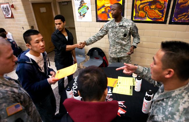 Photo: #Osseo High School senior Christopher Christie shakes hands with Sgt. 