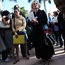 Job seekers wait to enter a job fair in Florida