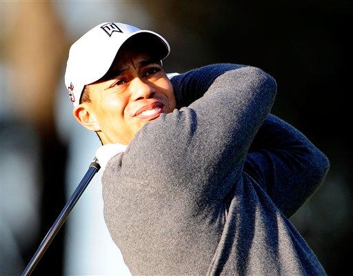 tiger woods house windermere. Tiger Woods practices golf