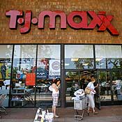 Customers shop at a T.J. Maxx store