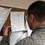 A man looks at employment notices