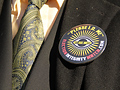 "Please I.D. Me" button
