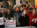 Protestors yell