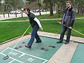 Playing shuffleboard