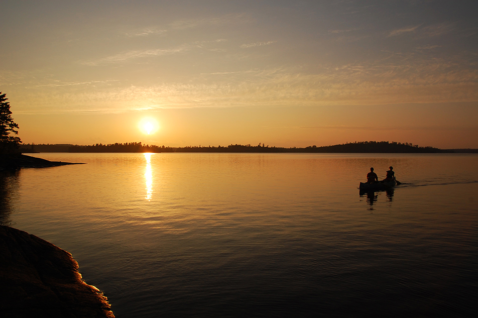 Canoeing at sunset
