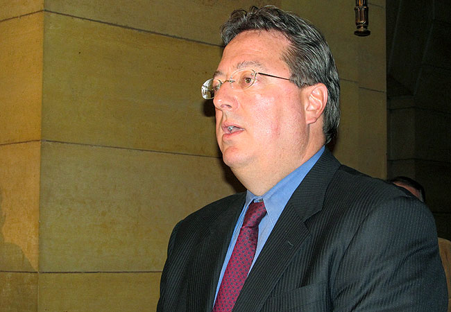 Lester Bagley, lobbyist for the Minnesota Vikings, speaks to reporters Tuesday, Nov. 1, 2011. Bagley said the team is committed to building in Arden Hills, Minn., and isn't willing to consider building in Minneapolis.