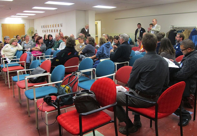Developers presented plans for the Minneapolis Public Schools site adjacent to the Lake/Hiawatha Light Rail station Thursday, Oct. 3, 2011. About 70 residents met in the only building on the nearly vacant property and voted to endorse the plan for several tall office and residential buildings.