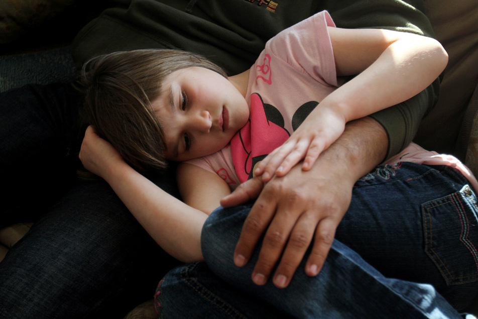 In her fathers arms