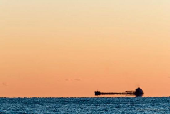 "I saw this ghost ship on Lake Superior last night. It passed by Grand Marais at sunset," Hansel wrote on January 3rd. 