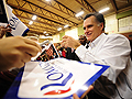 Mitt Romney greets supporters