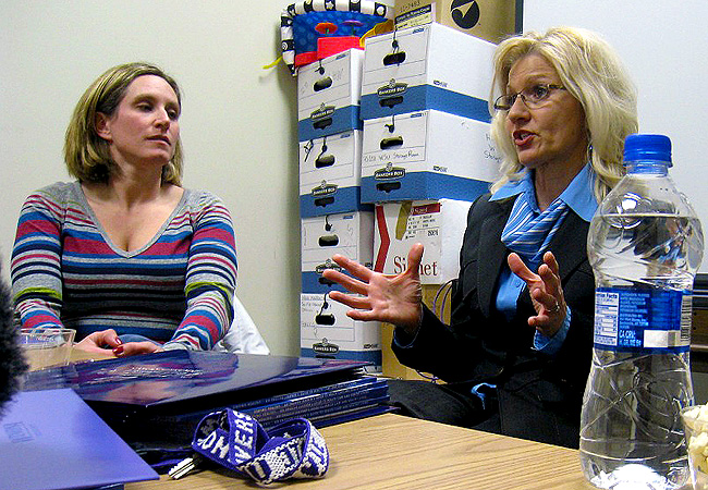 Winona State University Nursing Professor Carole Jenson, right, tells graduate nursing students this part of their nursing training is to emphasize cultural understanding. With the help of community liaisons, students like Sara Berding, left, will conduct home visits, go to churches and supermarkets, and build relationships with immigrant patients outside of the hospital and classroom walls. The program is part of a collaboration between researchers at the Mayo Clinic and more than a dozen community organizations to find ways to keep immigrants and refugees from developing common diseases, like diabetes, high blood pressure and obesity.