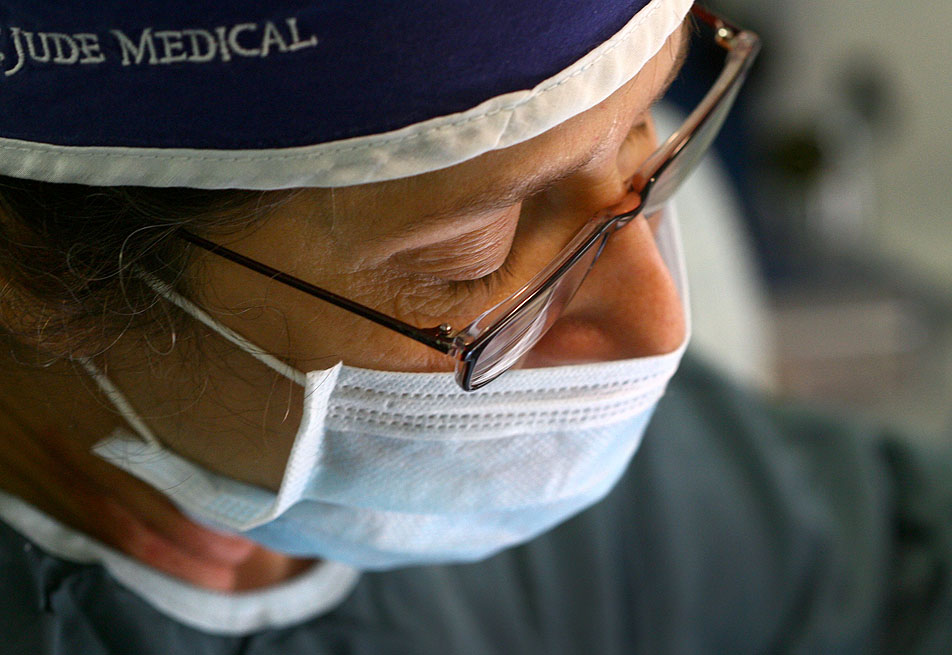 Kim Culbertson performs surgery