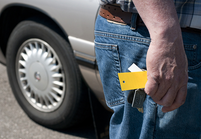 Dan Jones holds the keys to the used cars that are for sale through the Wheel Get You There car program run by the Minnesota Valley Action Council in MANKATO, Minn.