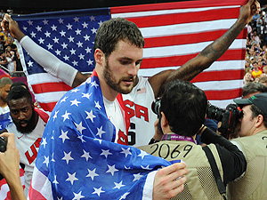 US forward Kevin Love celebrates after w