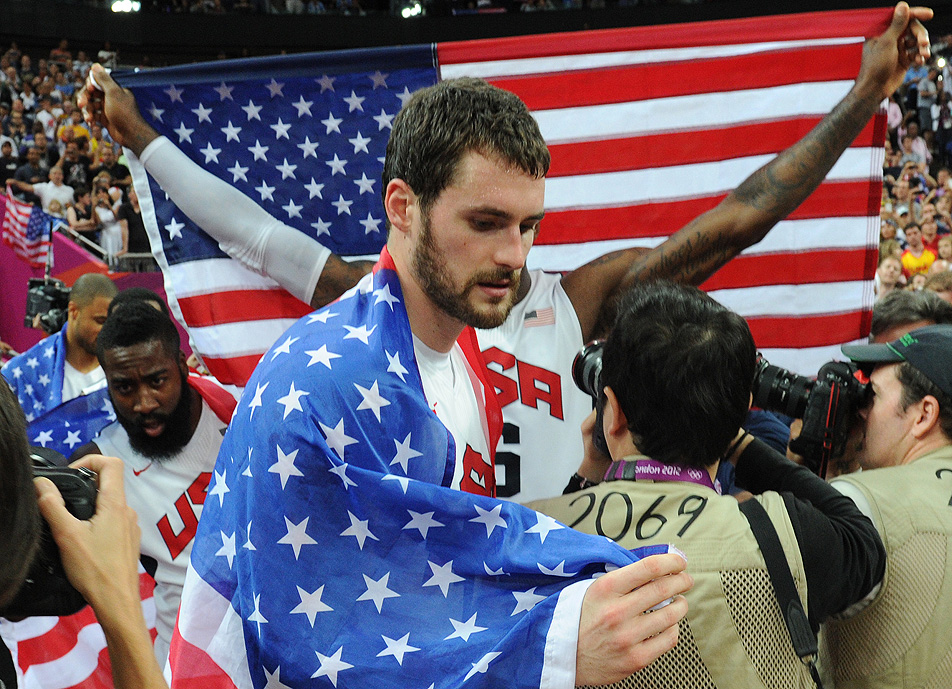 US forward Kevin Love celebrates after w