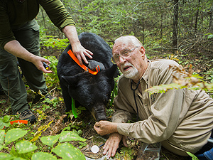 Rogers feeds June by hand