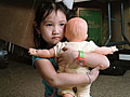 'Rabbit Holding Doll'