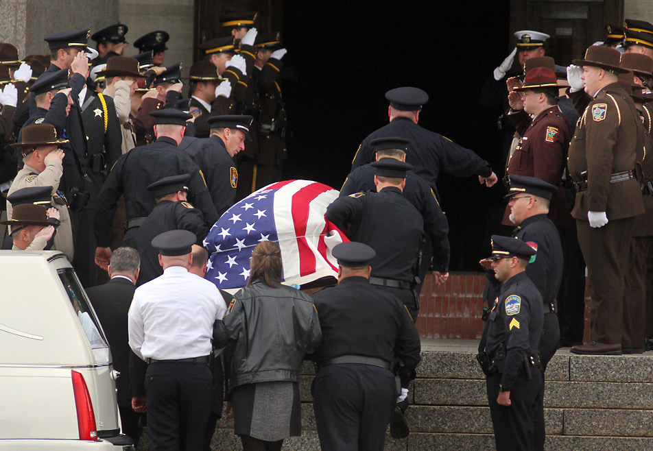 Casket carried into church