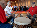 Beating a drum