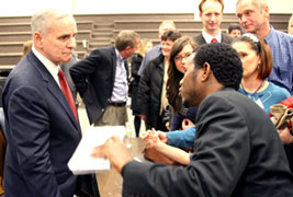 Dayton questioned on gun law proposals, education in St. Cloud town hall