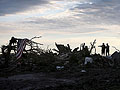 Residents search through rubble