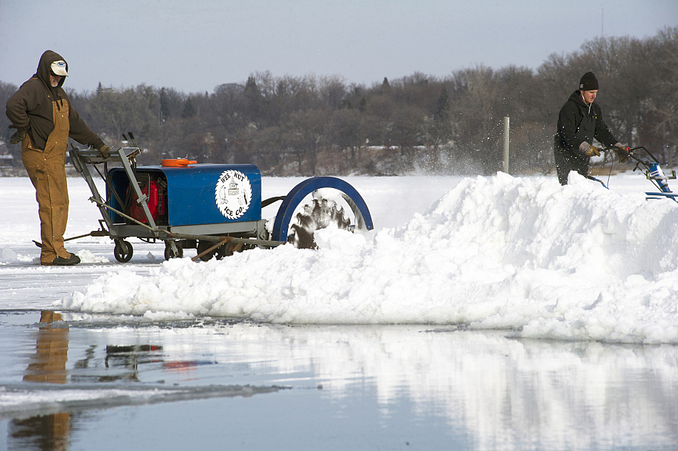 Ice harvest time on Lake Phalen as Winter Carnival nears Minnesota Public Radio News